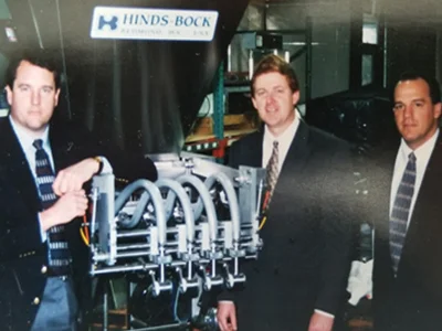 Lance Aasness, Gary Hinds and Rod Gregg with a Hinds-Bock multi-piston batter depositor
